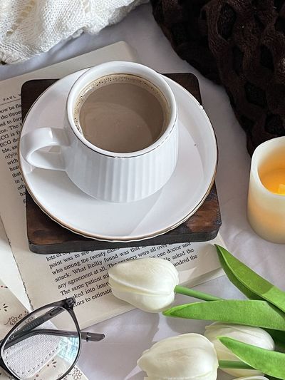 High angle view of coffee cup on table