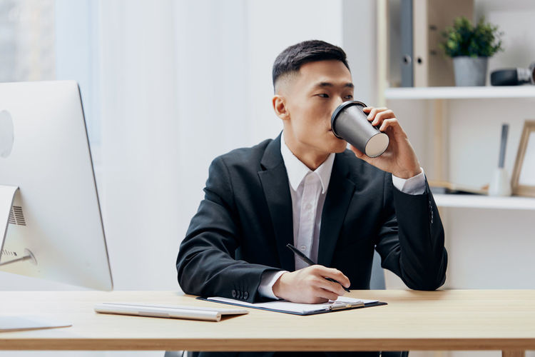Businesswoman working at desk in office