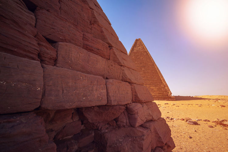  view of a pyramid of the black pharaohs in sudan with a view of a farther pyramid in the distance