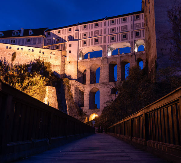 Illuminated buildings in city at night
