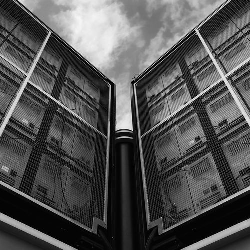Low angle view of modern buildings against sky