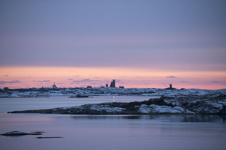 Vinga lighthouse on a snowy winter day by the coast in sweden