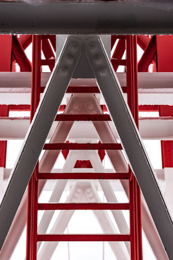 Pylon, red and white painted steel tower. the fragments showing the details of construction