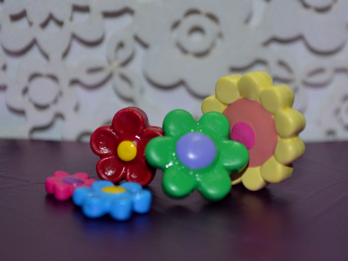 Close-up of multi colored candies on table