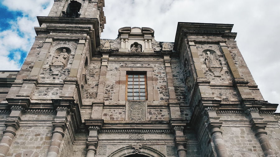 Low angle view of historical building against sky