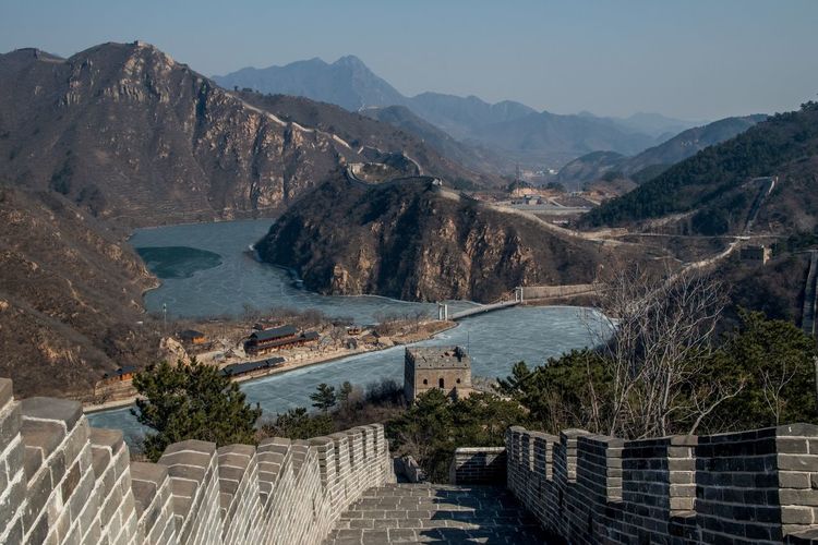 High angle view of dam amidst mountains