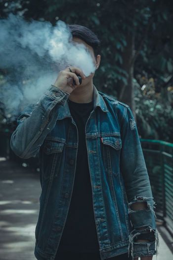 Smoke, young man , levis