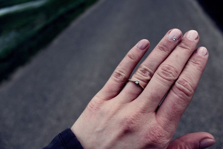 Cropped hand of woman wearing ring