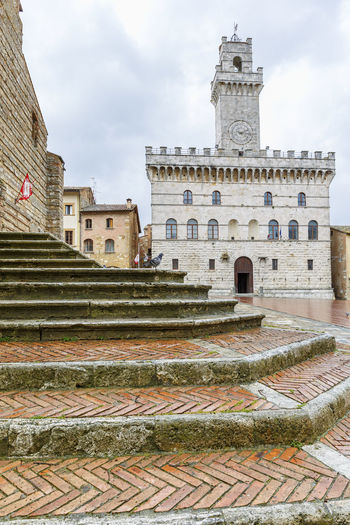 Stairs at a pizza with a palace in italy