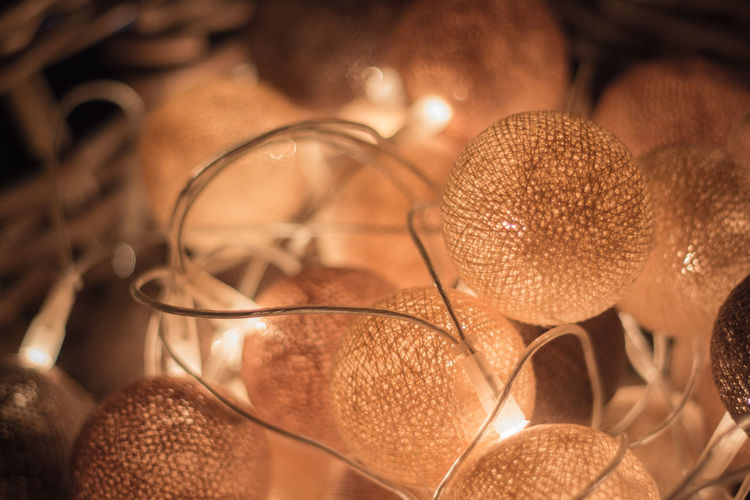 Close-up of illuminated cotton ball lights