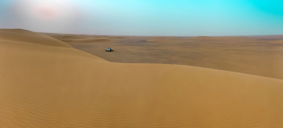 Scenic view of desert against sky
