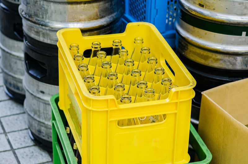High angle view of bottles in crate