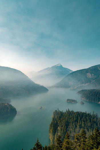 Smoke from nearby wild fires settle at diablo lake in north cascades national park