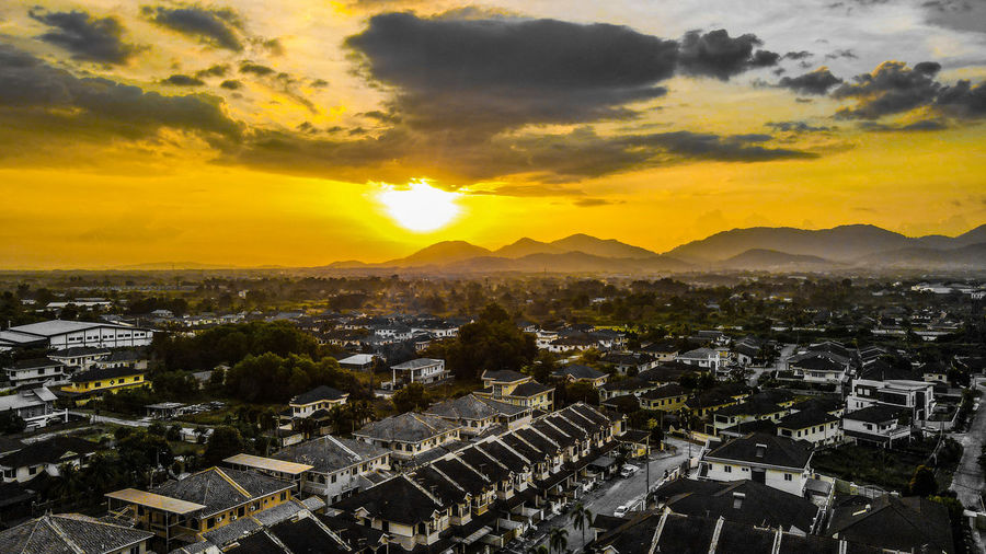 High angle view of townscape against sky during sunset