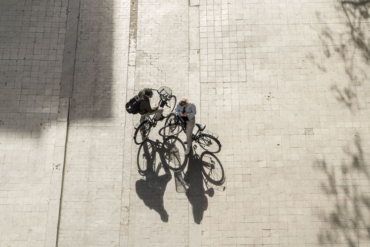 Shadow of man riding bicycle on wall