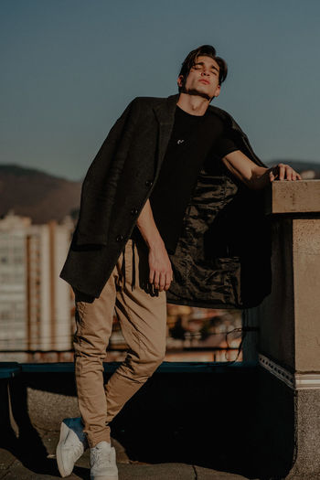 Full length of man standing against sky