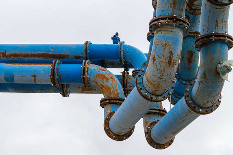 Low angle view of rusty machinery