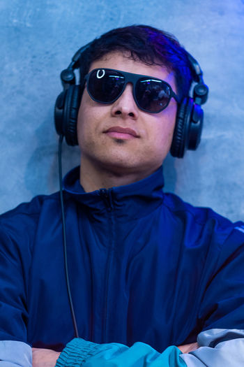 Portrait of dj wearing headphones