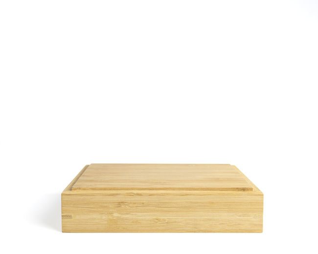 Close-up of wooden planks over white background