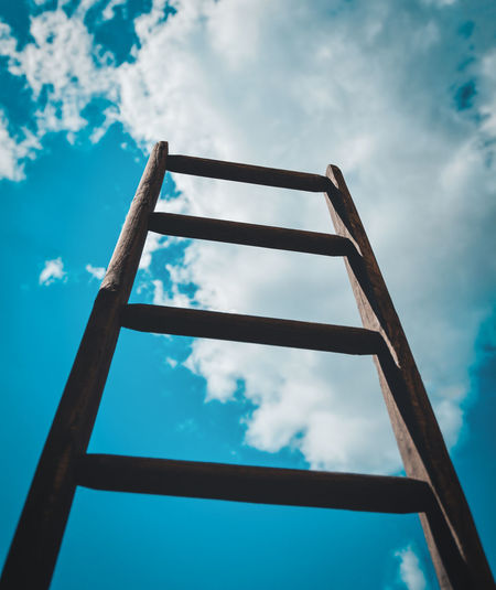 Low angle view of ladder against sky