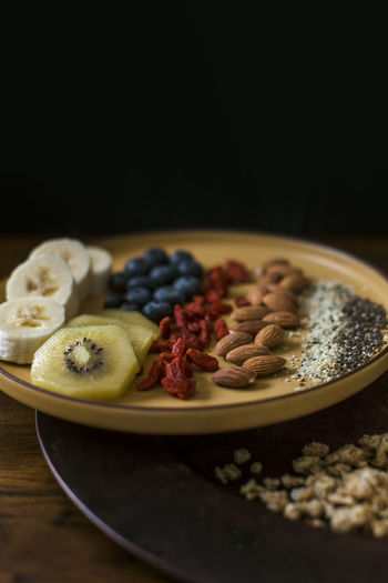Healthy breakfast plate of fruit and seeds