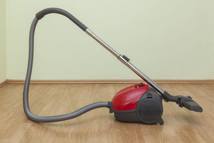 Vacuum cleaner on hardwood floor