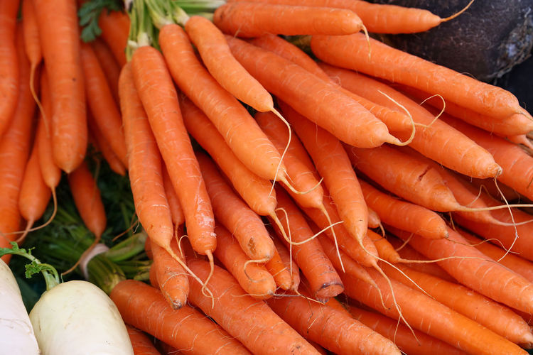 Close-up of carrots for sale at market stall