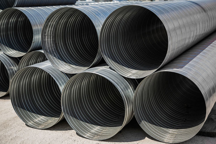 Ventilation pipe warehouse. steel pipes, parts for the construction of air ducts for an industrial