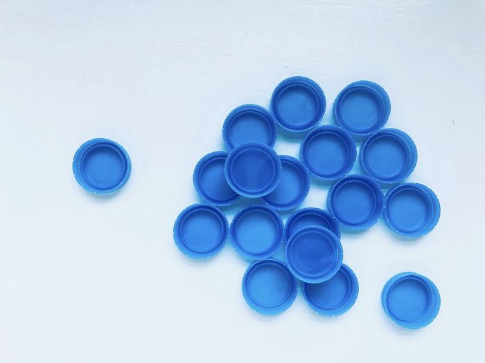 High angle view of blue balls on white table