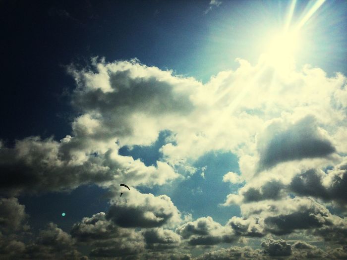 Sun shining through clouds