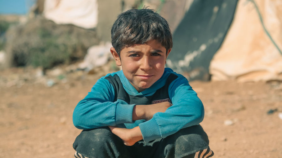 Portrait of child in a syrian refugee camp. 
