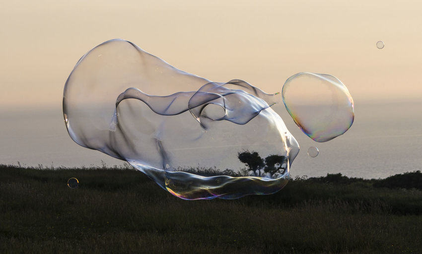 DIGITAL COMPOSITE IMAGE OF BUBBLES IN GLASS