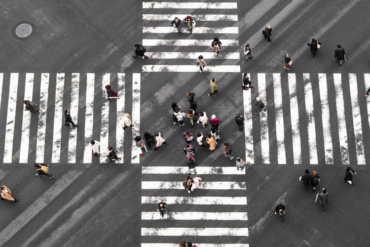 Directly above shot of people crossing road