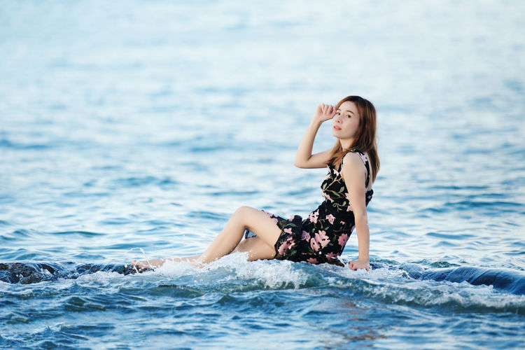 Young woman in sea