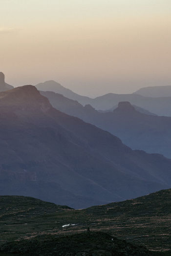 Scenic view of mountains against sky during sunset