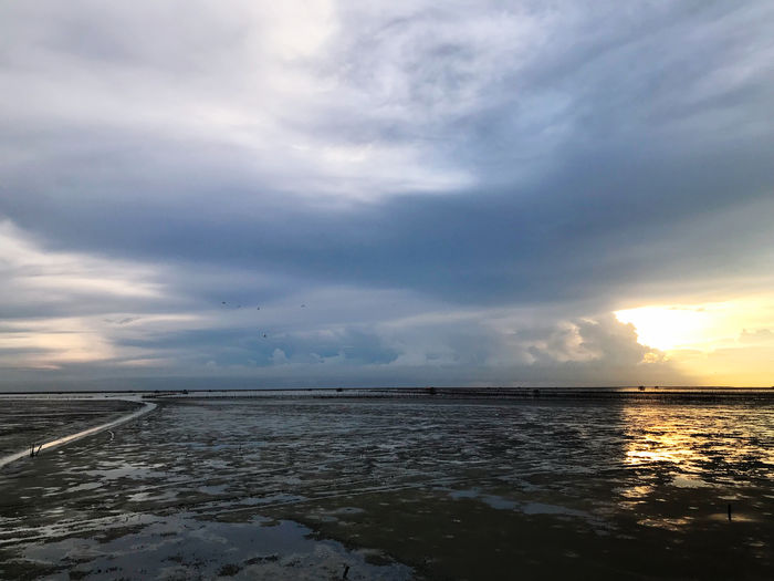 Scenic view of sea against sky during sunset