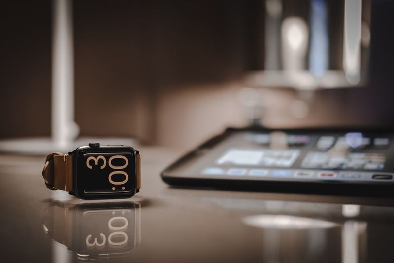 Close-up of smart watch on table