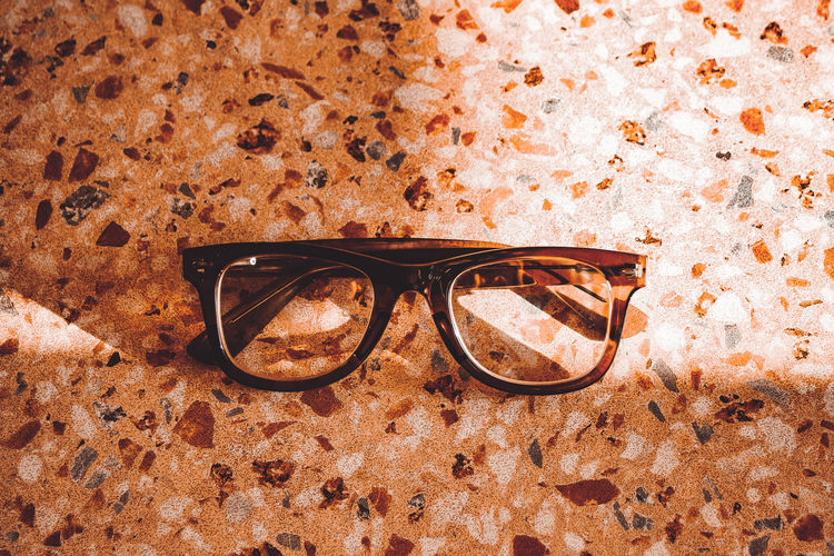 High angle view of eyeglasses on sunglasses