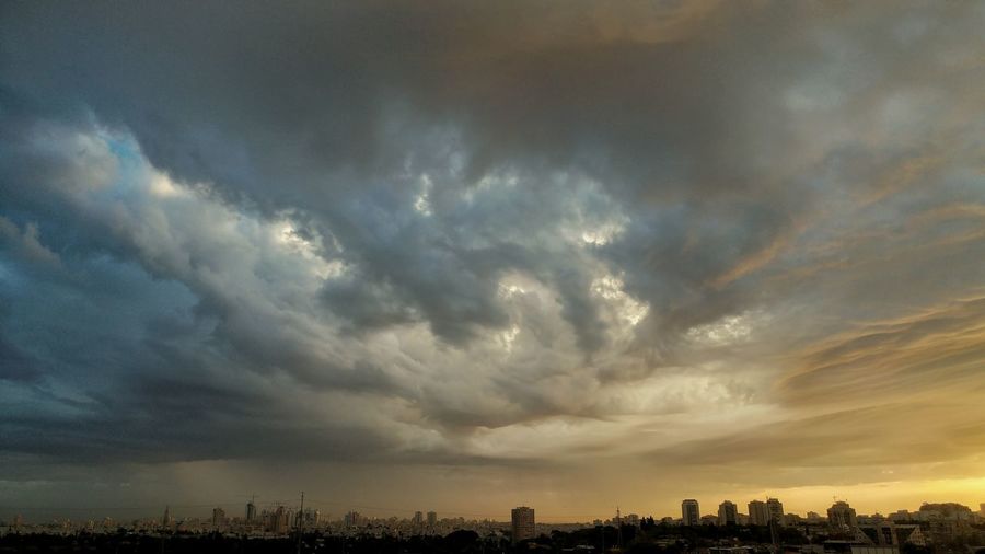Storm clouds over city