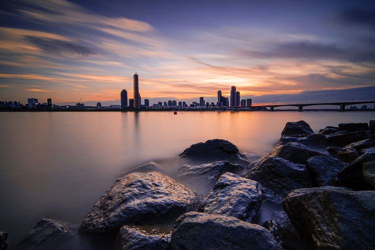 Scenic view of sea against sky during sunset