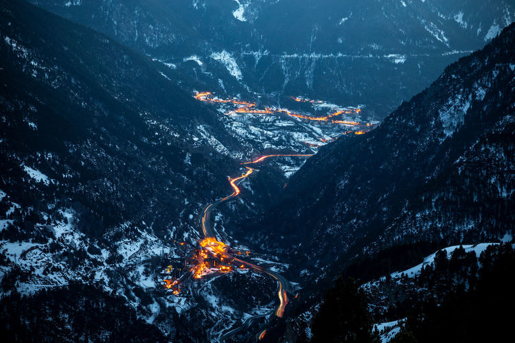 Aerial view of illuminated cityscape at night