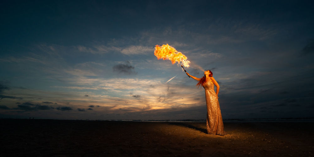 Fire breathing with donia serena on the beach