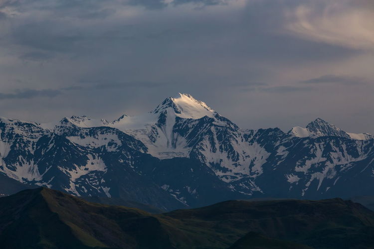 Scenic view of snowcapped mountains against sky during winter. mount diklosmta in the caucasus. 