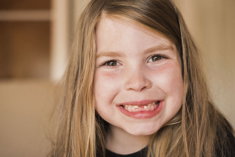 Close-up portrait of smiling girl