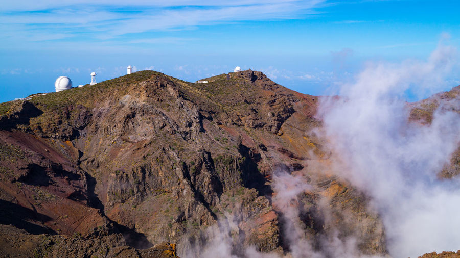 Panoramic mountain view of reflector and normal telescopes in canary islands 