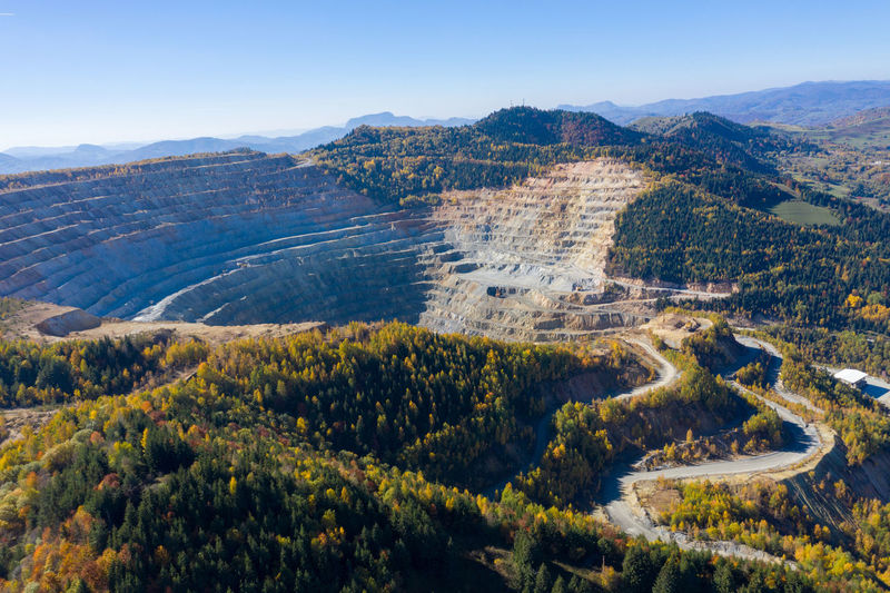 Aerial drone view of rosia poieni open pit copper mine, romania