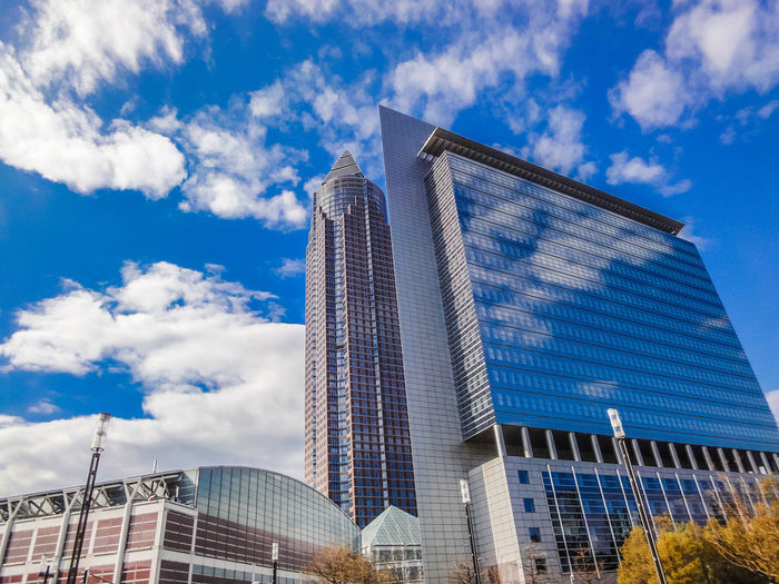 Low angle view of modern buildings against sky