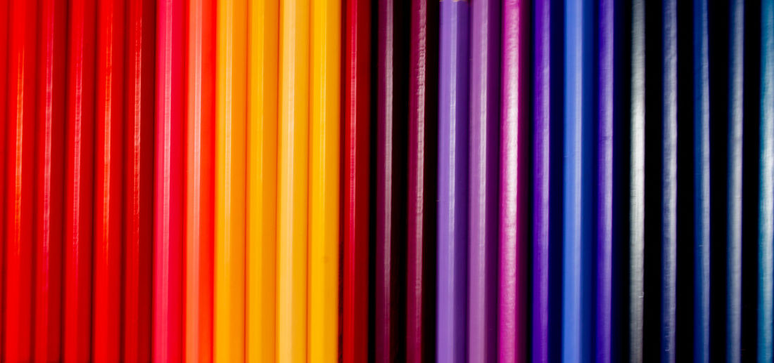Full frame shot of multi colored tongue depressors