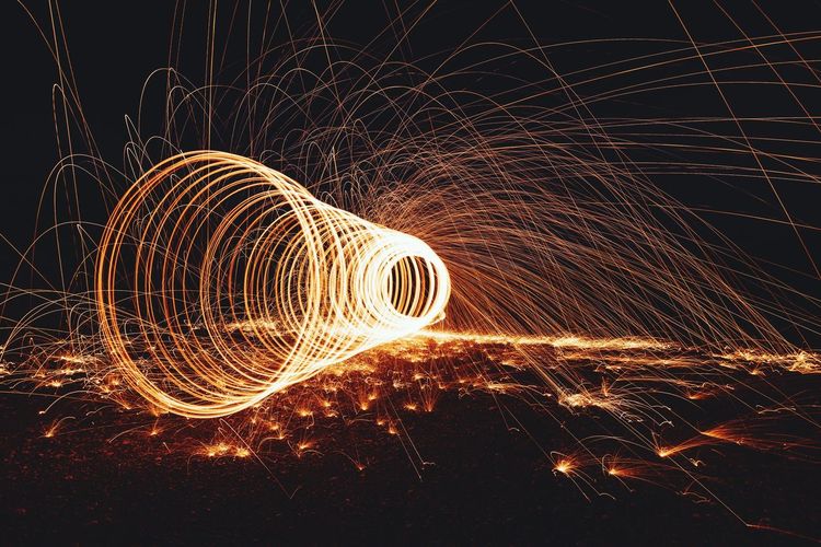 Wire wool on field at night
