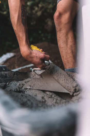 Midsection of man working